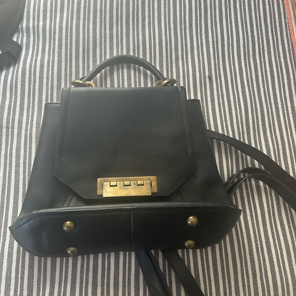 Zac Posen Black and Gold Backpack with Structured Design